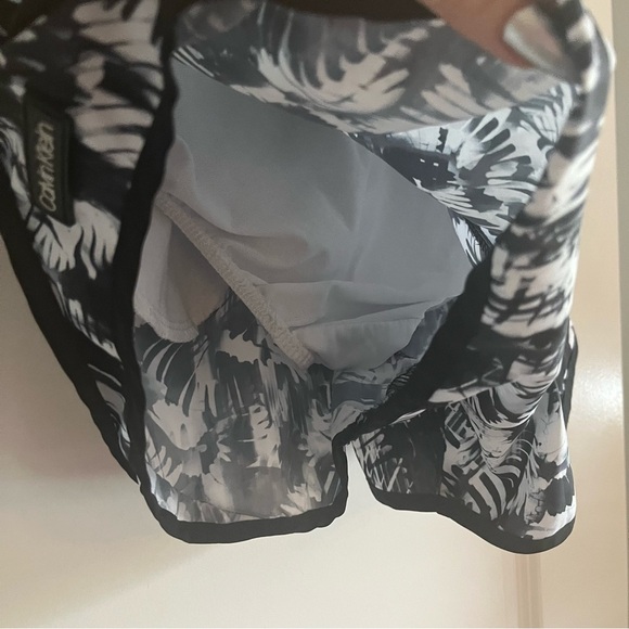 Calvin Klein running shorts black and white. Tie string and built in underwear. - Picture 5 of 7